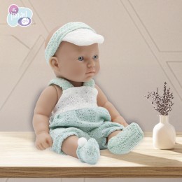 26 CM DOLL IN GREEN PANTS...