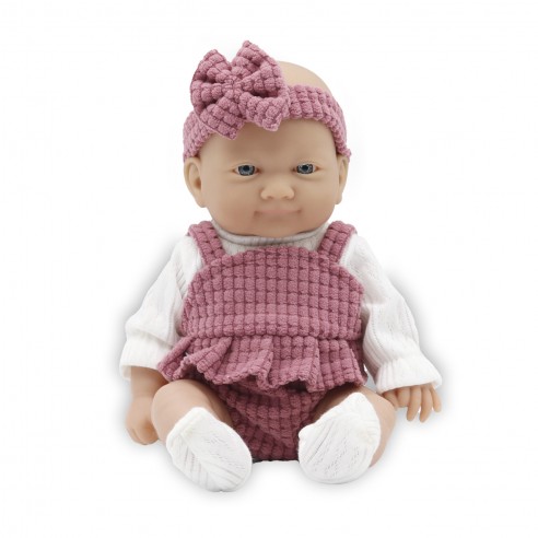 26 CM DOLL IN A PINK SKIRT AND PANTS...