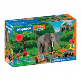ELEPHANT WITH CAREGIVER...